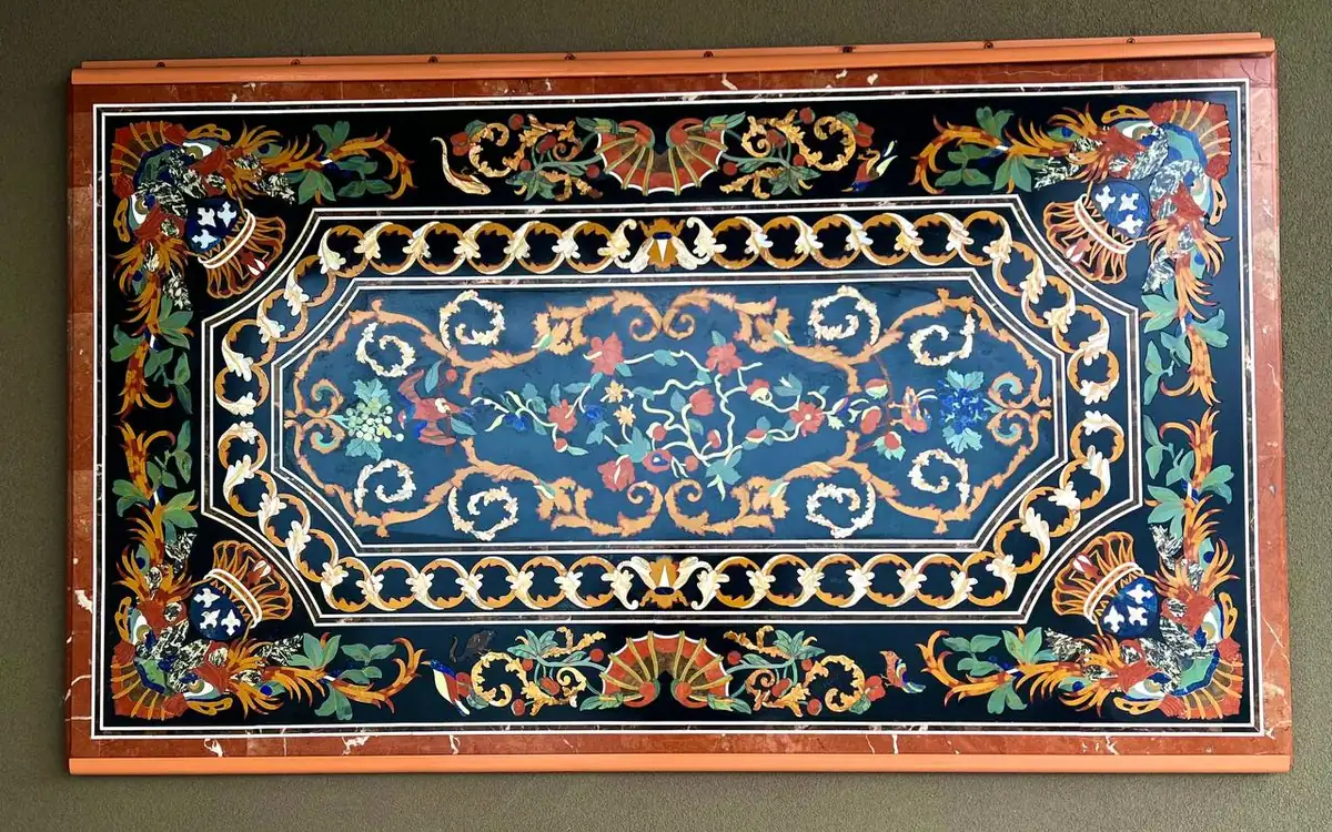 Inlaid marble panel after polishing and color restoration
